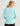 Huk women's Pursuit Performance Crew in Caicos, stain-release long-sleeve performance fishing shirt, side view