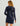 Huk women's Pursuit Cover-Up Dress in Naval Academy, back view