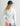 Huk women's Icon Performance Hoodie in White, quick-drying long-sleeve fishing hoodie, back view