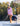Huk women's Icon Performance Hoodie in Oleander, breathable long-sleeve fishing hoodie, worn on the water