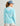 Huk women's Icon Performance Hoodie in Caicos Sea Spray, quick-drying long-sleeve fishing hoodie, side view