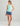 Huk women's Bayside Racerback Tank in Caicos Heather, 4-way stretch fishing tank top, back view, alternate angle