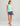 Huk women's Bayside Racerback Tank in Caicos Heather, 4-way stretch fishing tank top, back view