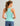 Huk women's Bayside Racerback Tank in Caicos Heather, 4-way stretch fishing tank top, side view