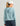 Huk women's Pursuit Maren Hoodie in Blue Shadow, stretch long-sleeve fishing hoodie, side view