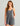 Huk women's Bayside Romper in Anchor Heather, 4-way stretch fishing bottoms, front view