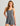 Huk women's Bayside Romper in Anchor Heather, breathable fishing bottoms, front view, alternate angle