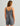 Huk women's Bayside Romper in Anchor Heather, breathable fishing bottoms, side view