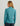 Woman wearing teal 1/4 zip pullover with long sleeves, shown from back view against neutral background.