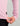 Pink women's pullover with quarter-zip neckline and black brand label on side seam.