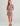 Women's long-sleeve cover-up dress in burgundy with white geometric pattern, drawstring hem detail, and half-zip neckline.