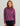 Woman wearing HUK Women's Coldfront+ Fleece Half-Zip in Mdnght Cv Heather