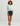 Huk women's Tide Point Oversized Shirt in Heron Blue, stretch performance fishing shirt, back view