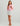 Huk women's Tide Point Oversized Shirt in Oleander, quick-drying performance fishing shirt, back view