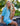 Huk women's Women Breezeway Camp Shirt in Heron Blue Conch Shell, button-down fishing shirt, lifestyle photo on the water