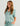 Huk women's Women Breezeway Camp Shirt in Heron Blue Conch Shell, button-down fishing shirt, front view, alternate angle