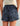 Navy swim shorts with blue leaf print and elastic waistband.