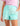 Huk women's Pursuit Volley Swim Short in Caicos Sea Spray, 4-way stretch fishing shorts, front view, alternate angle