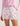 Huk women's Pursuit Volley Swim Short in Oleander Conch Shell, quick-drying fishing shorts, front view