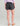 Huk women's Cruiser Short in Volcanic Ash, stretch fishing shorts, back view