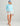 Huk women's Isla Short in Seagull, stretch fishing shorts, back view