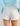 Huk women's Isla Short in Seagull, moisture-wicking fishing shorts, side profile view