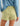 Huk women's Isla Short in Spanish Moss, UPF 30+ sun protection fishing shorts, side profile view