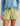 Huk women's Isla Short in Spanish Moss, stretch fishing shorts, fabric and stitching close-up
