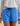 Huk women's Isla Short in Regatta, moisture-wicking fishing shorts, front view, alternate angle