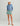 Huk women's Embark Skort in Mineral Blue, quick-drying fishing bottoms, back view