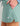 Huk women's Embark Skort in Mineral Blue, moisture-wicking fishing bottoms, construction detail