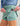 Huk women's Embark Skort in Mineral Blue, stretch fishing bottoms, logo and branding detail