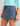 Huk women's Embark Skort in Vintage Indigo, UPF 50+ sun protection fishing bottoms, front view