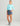 Huk women's Embark Skort in Vintage Indigo, quick-drying fishing bottoms, back view