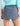 Huk women's Embark Skort in Vintage Indigo, moisture-wicking fishing bottoms, side view