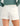 Huk women's Embark Short in Egret, quick-drying fishing shorts, side view