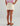 Huk women's Cruiser Skort in Egret, stretch fishing bottoms, side view