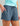 Huk women's Bayside Short in Vintage Indigo Heather, 4-way stretch fishing shorts, front view, additional angle