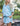 Huk women's Breezeway Short in Heron Blue Conch Shell, fishing shorts, lifestyle photo on the water