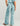 Huk women's Breezeway Printed Pant in Heron Blue Conch Shell, fishing pants, side view