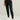 Woman wearing HUK Women's Coldfront+ Fleece Jogger in Heather Black