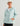 Huk women's Storm Jacket 2.0 in Heron Blue, rain jacket, front view, alternate angle