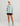 Huk women's Storm Jacket 2.0 in Heron Blue, rain jacket, back view