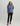 Women's hooded jacket with purple and teal storm print pattern, full-length sleeves, front zip closure, and side pockets.