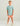 Child wearing light blue t-shirt with red comic-style graphic on chest and coral shorts.