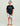 Huk kids' Pursuit Short Sleeve Performance Shirt in Black, stretch short-sleeve performance fishing shirt, front view, alternate angle