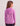 Girl wearing a pink performance hoodie with hood down, shown from behind against a neutral background.