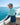 Huk kids' Pursuit Performance Graphic Hoodie in Caicos, breathable long-sleeve fishing hoodie, worn on the water