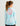 Huk youth Girls Pursuit Performance Hoodie in Caicos Conch Shell, quick-drying long-sleeve fishing hoodie, side profile view