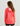 Huk youth Girls Pursuit Performance Hoodie in Neon Coral, breathable long-sleeve fishing hoodie, side view